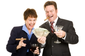 Business partners holding a wad of cash while smoking cigars and drinking cocktails. Isolated.